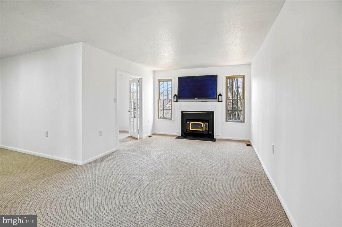 860 Woodmont Road Annapolis, MD 21401 - Photo 10 of 55 Living Room with Fireplace