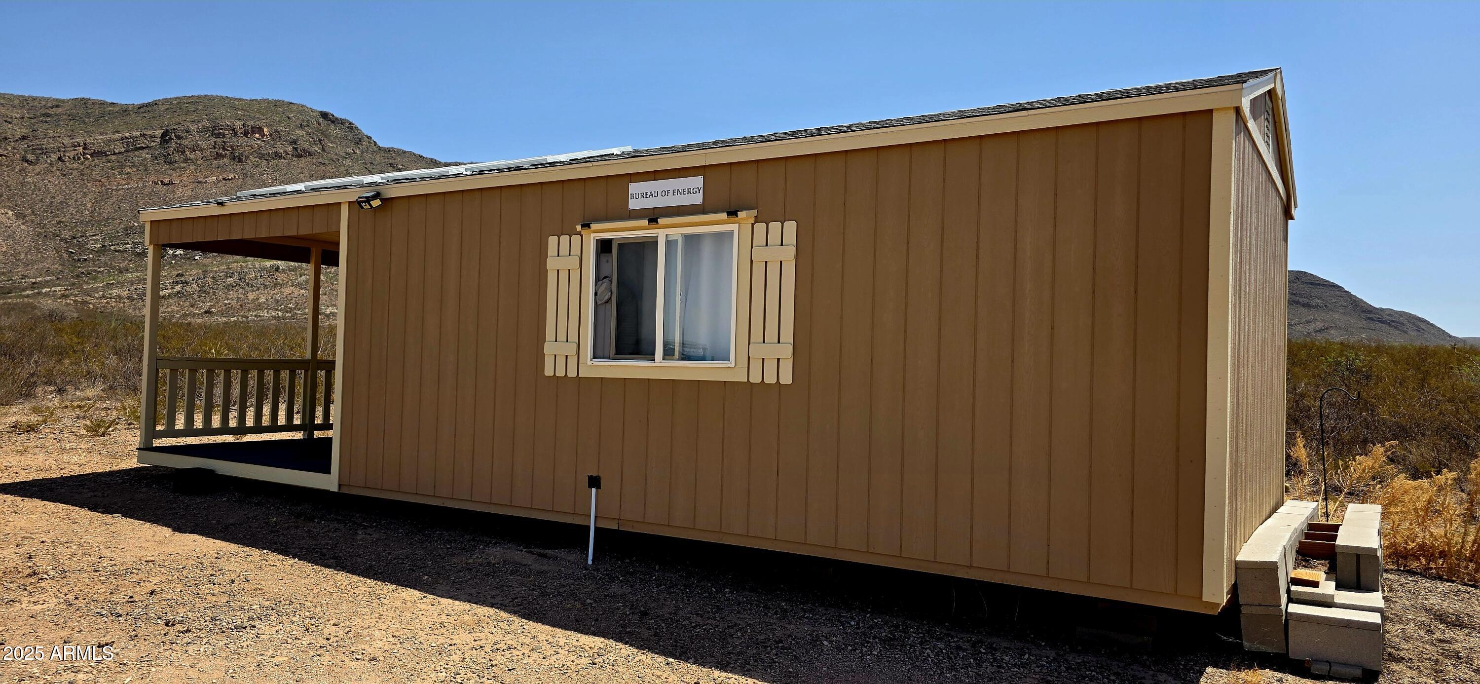 Lot 4 South Macks Way, Unit 4 Tombstone, AZ 85638 - Photo 2 of 22 a view of a house with a large window