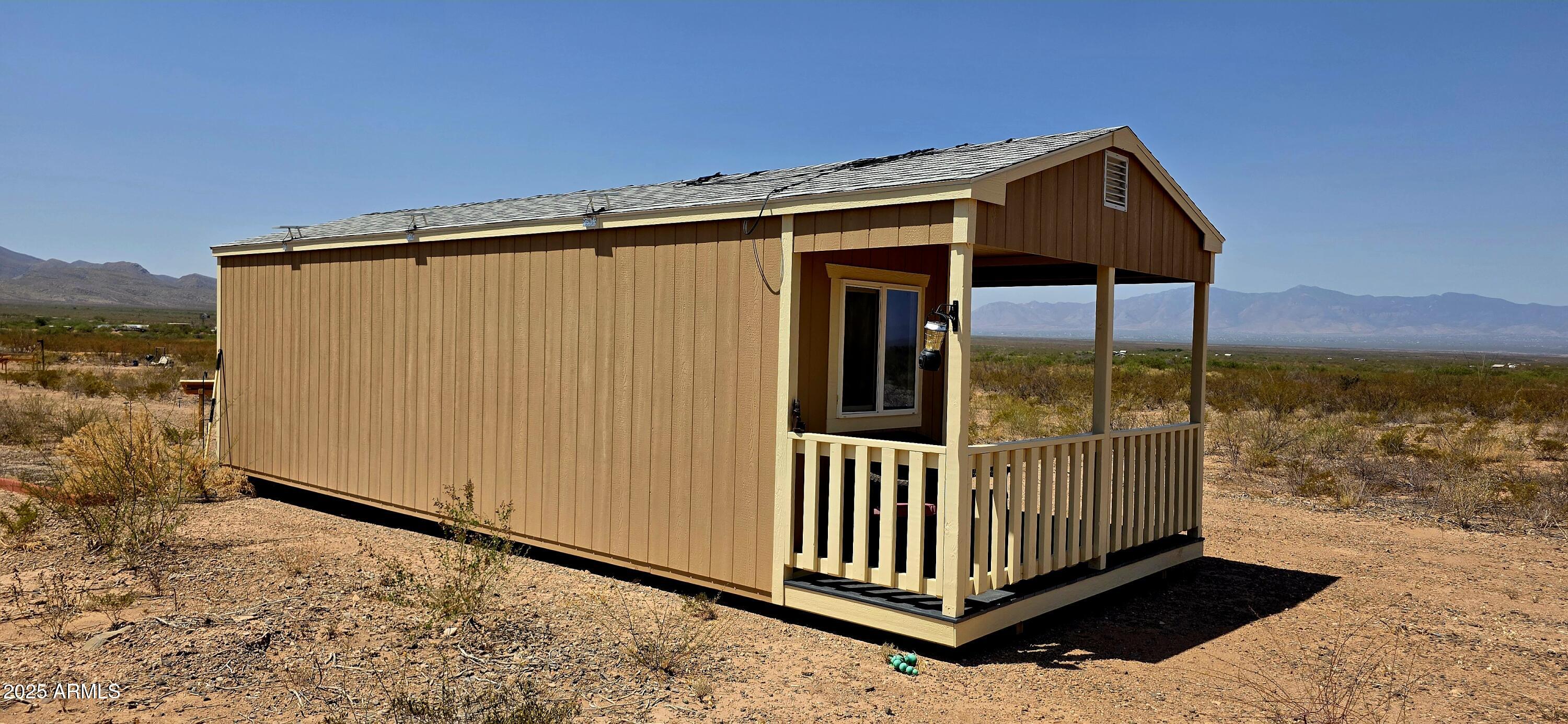 Lot 4 South Macks Way, Unit 4 Tombstone, AZ 85638 - Photo 3 of 22 a view of a backyard with a fence