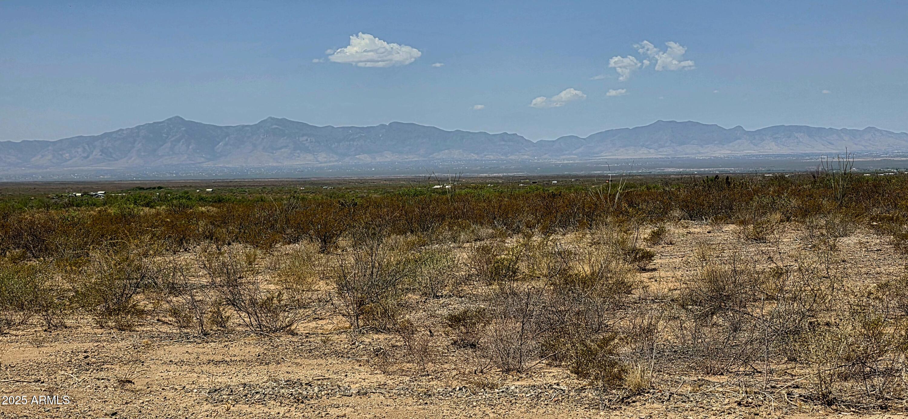 Lot 4 South Macks Way, Unit 4 Tombstone, AZ 85638 - Photo 6 of 22 a view of an ocean with a mountain