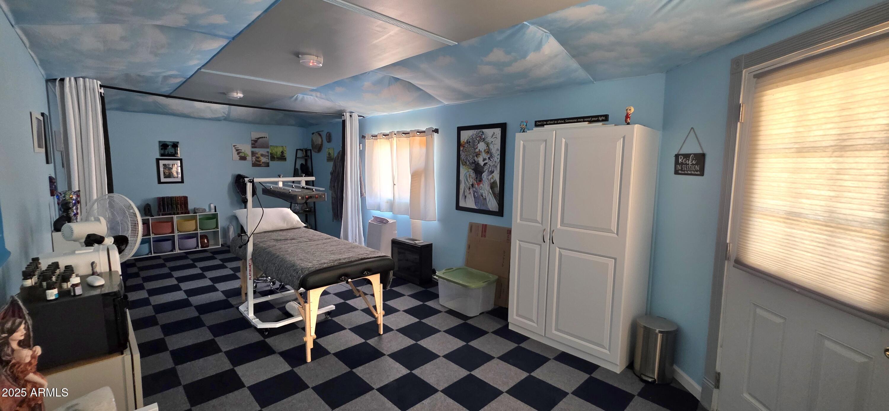 Lot 4 South Macks Way, Unit 4 Tombstone, AZ 85638 - Photo 7 of 22 a room with furniture a rug and a window