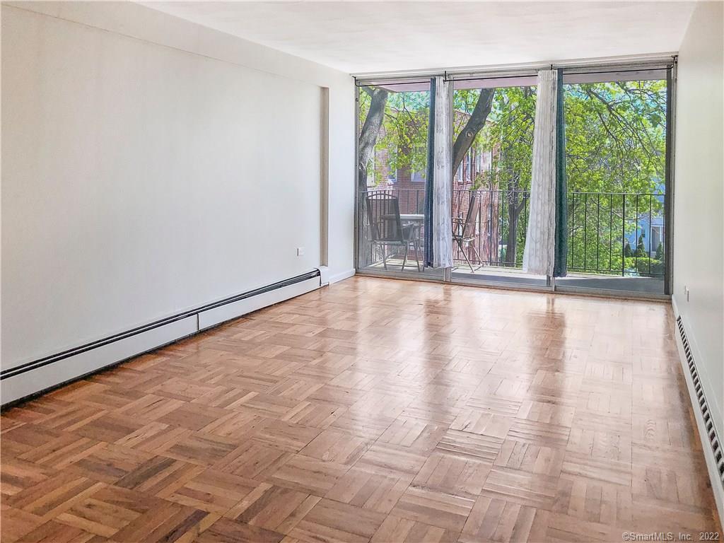 87 Glenbrook Road, Unit 3E Stamford, CT 06902 - Photo 11 of 11 a view of an empty room with a window
