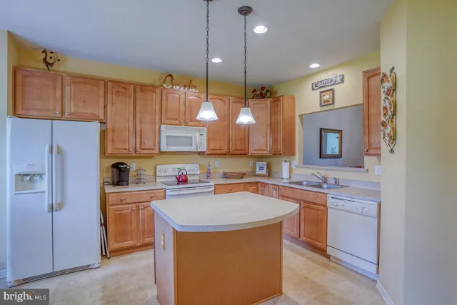 a dinning room and kitchen with a table