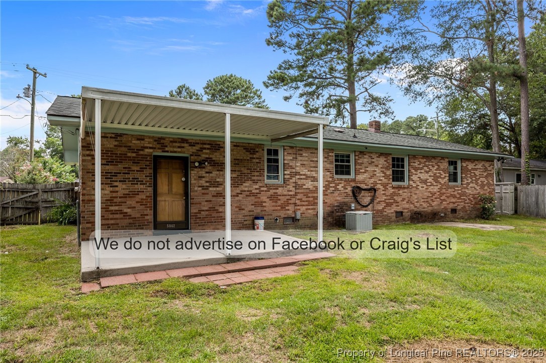 5842 Columbine Road Fayetteville, NC 28306 - Photo 13 of 13 a front view of a house with a yard