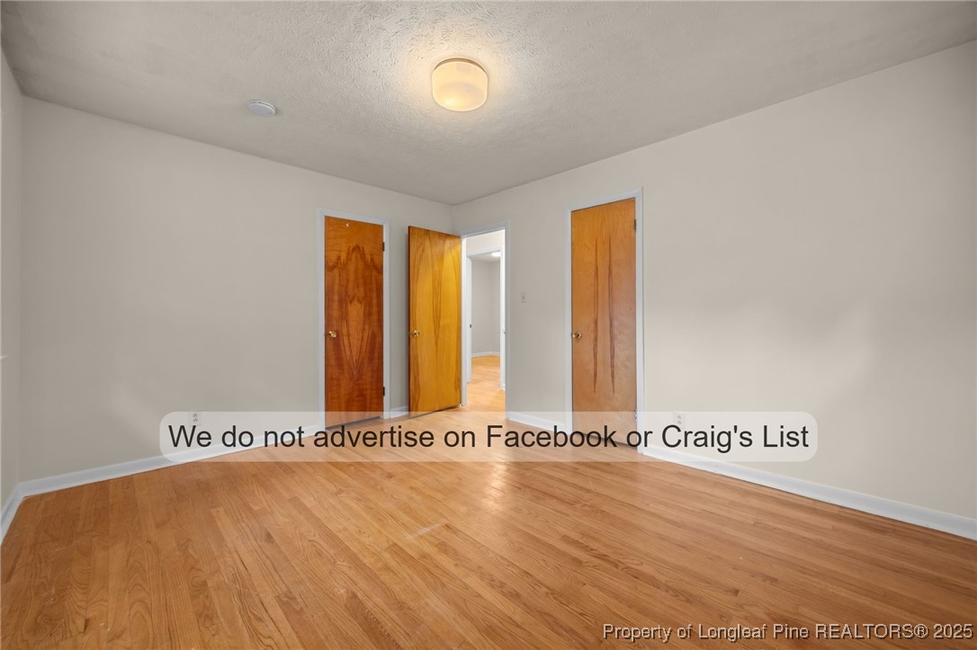 5842 Columbine Road Fayetteville, NC 28306 - Photo 5 of 13 an empty room with a window