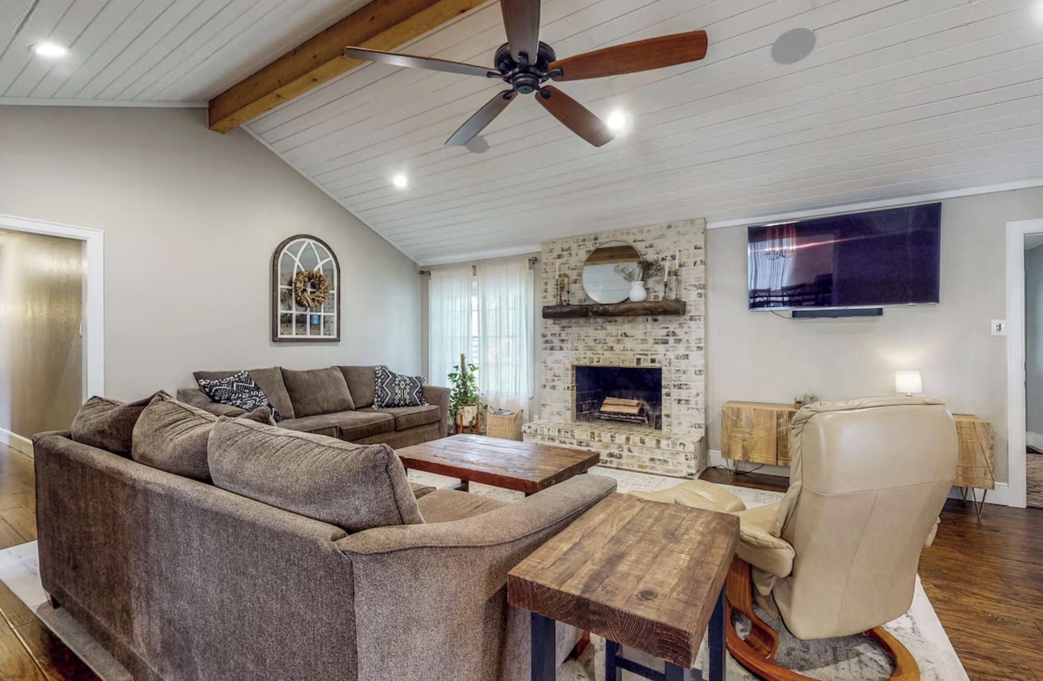 30819 Quinn Road Tomball, TX 77375 - Photo 7 of 30 a living room with furniture and a fireplace