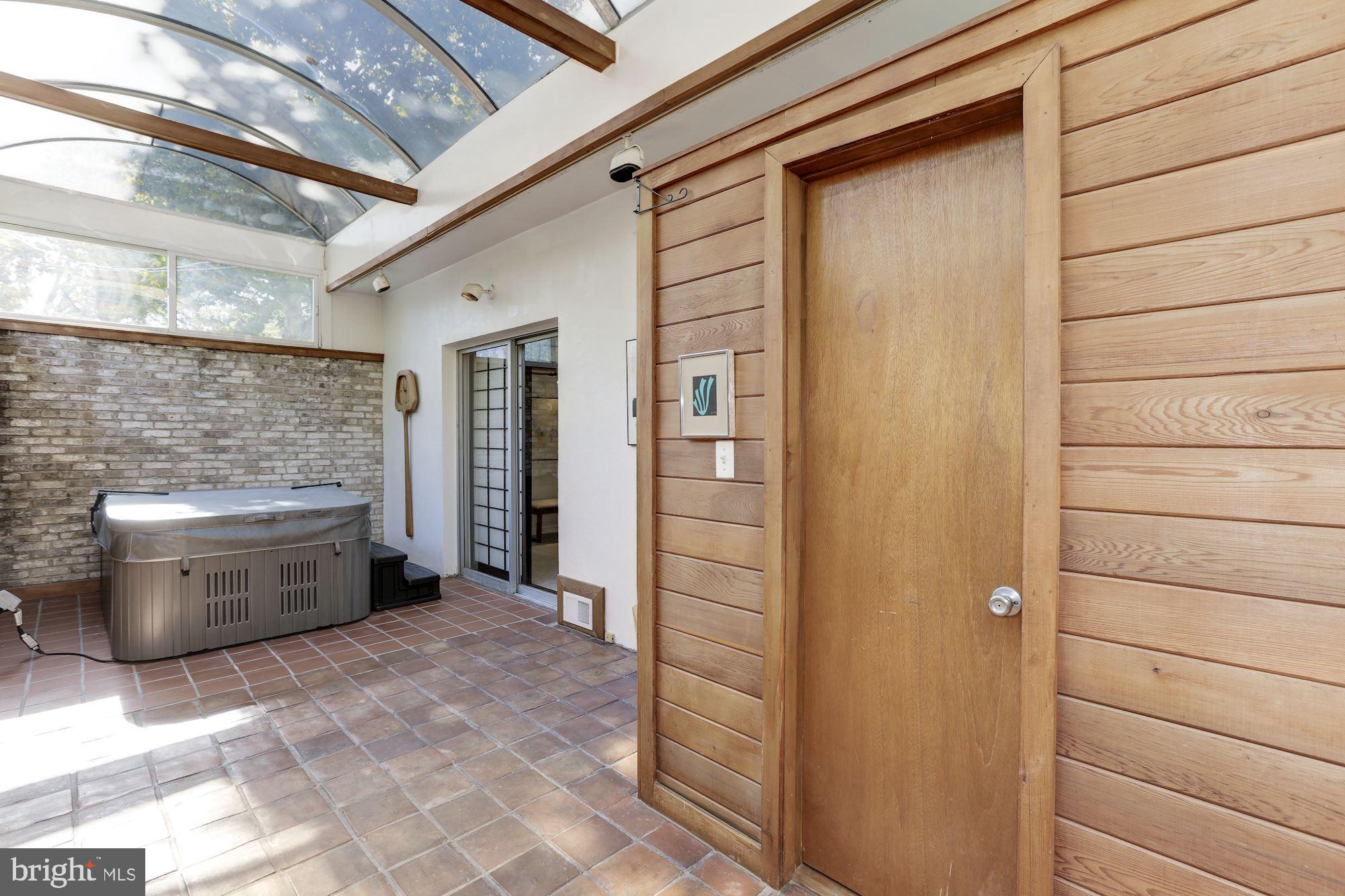 4870 Reservoir Road Northwest Washington, DC 20007 - Photo 20 of 44 Sunroom with Hot Tub