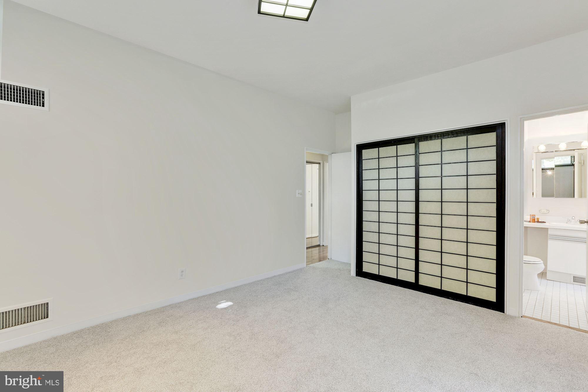 4870 Reservoir Road Northwest Washington, DC 20007 - Photo 24 of 44 Master Bedroom with Ensuite Bath and Large Closet