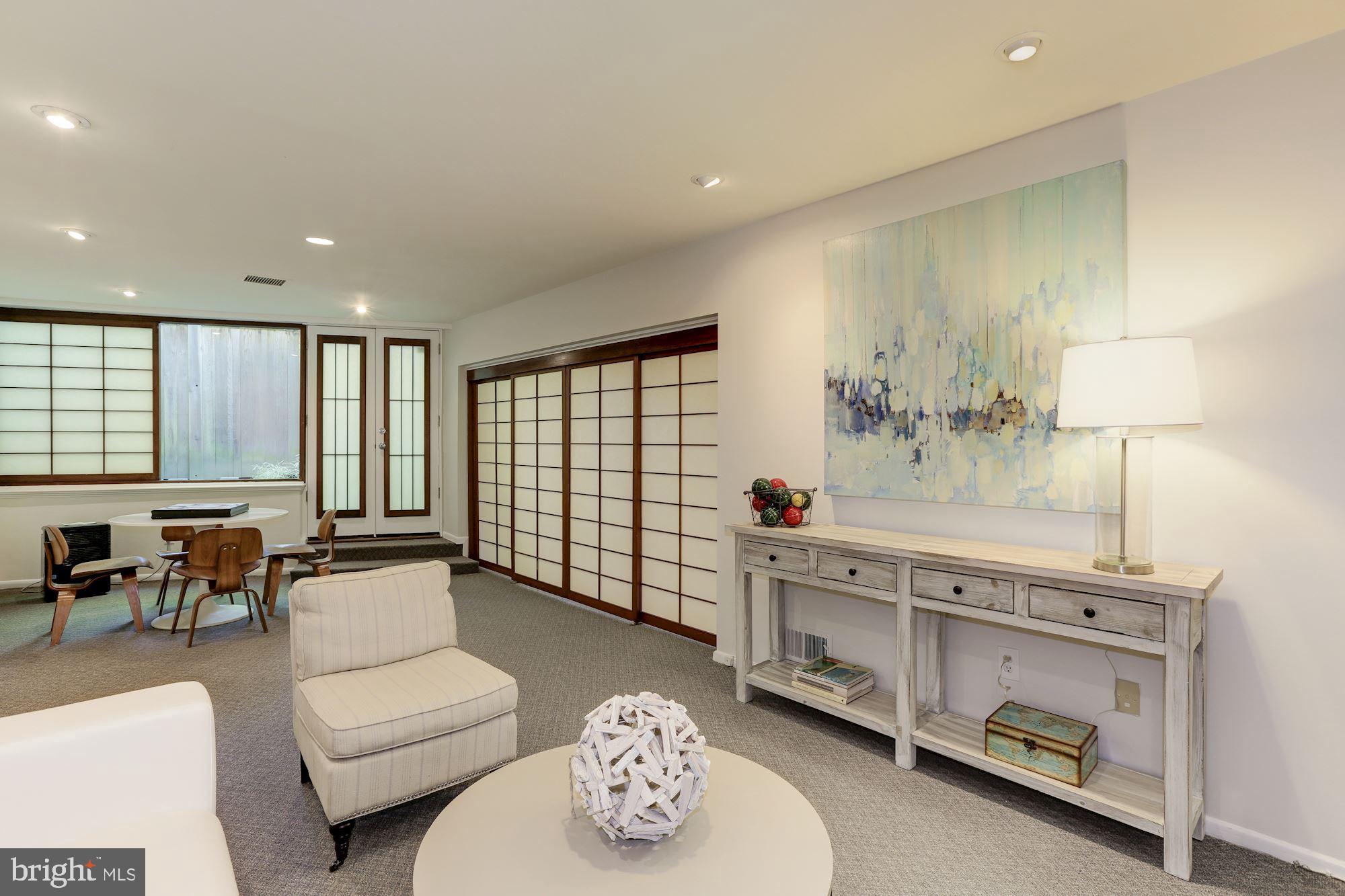 4870 Reservoir Road Northwest Washington, DC 20007 - Photo 29 of 44 Lower Level Family Room with Double Doors to Patio