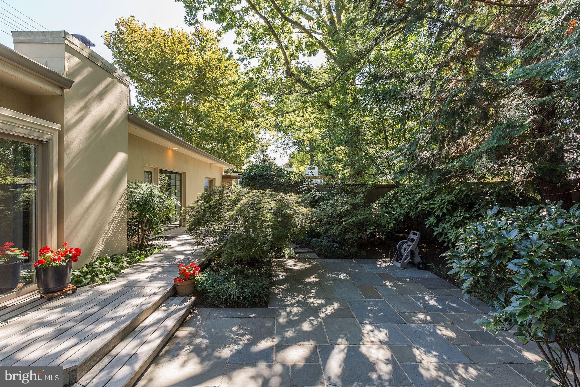 4870 Reservoir Road Northwest Washington, DC 20007 - Photo 40 of 44 Upper Level Patio, Deck and Lush Gardens
