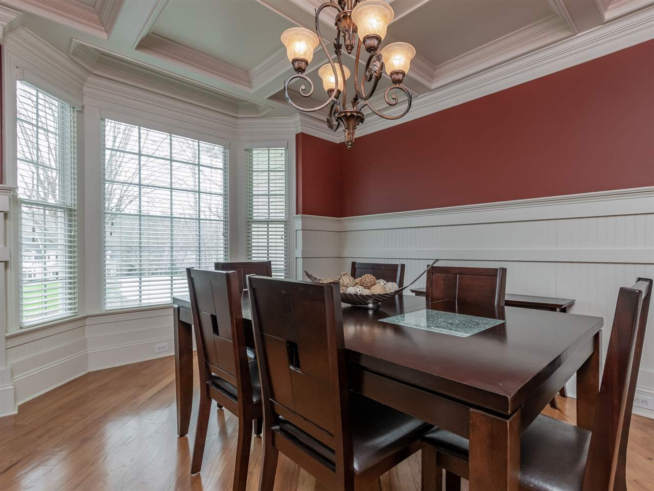 1413 Wynncrest Court Raleigh, NC 27603 - Photo 8 of 30 Coffered ceiling and wainscoting in formal dining room