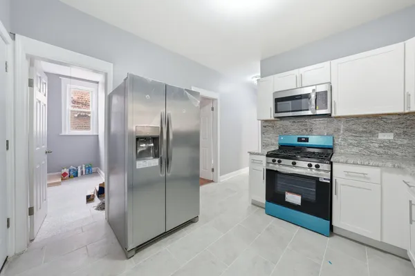 $330,000 | 7544 South Eberhart Avenue, Chicago, IL 60619