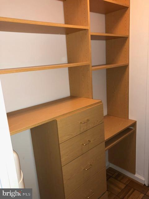 1 Scott Circle Northwest, Unit 814 Washington, DC 20036 - Photo 4 of 15 Spacious closet with organized shelving.