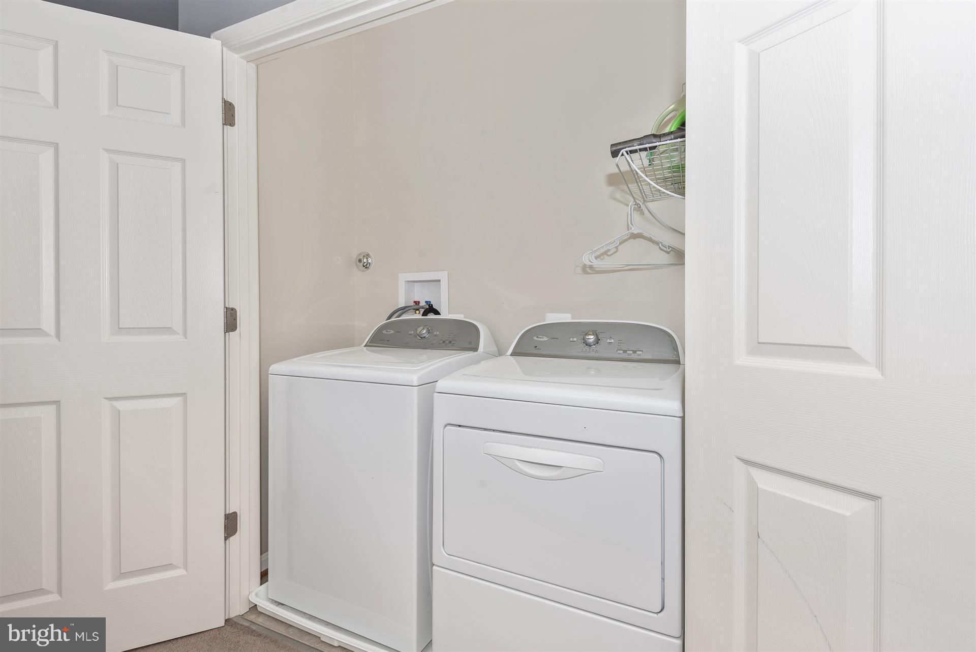 640 Tivoli Road Frederick, MD 21703 - Photo 16 of 29 Laundry Closet on 2nd level w/washer & dryer