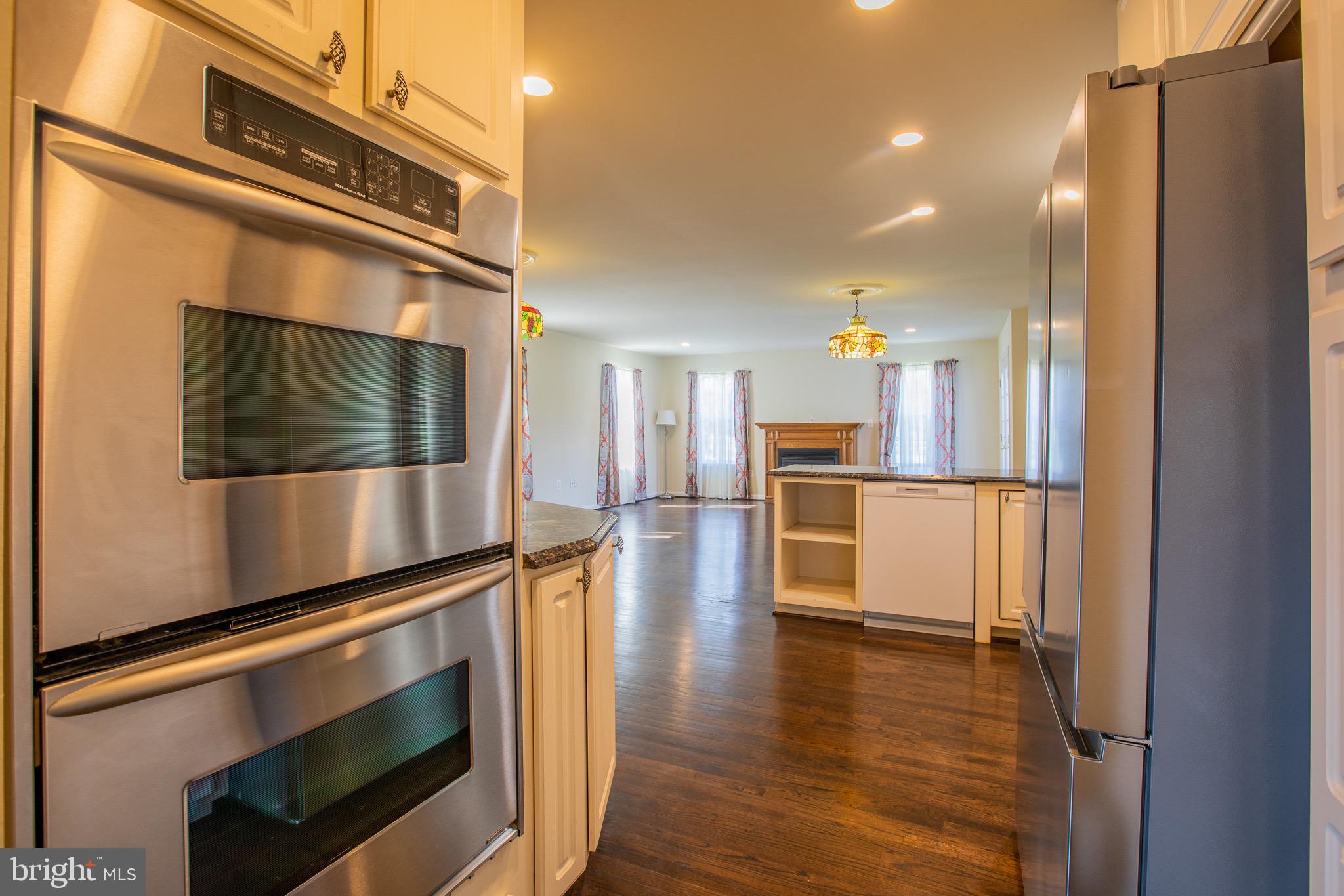 5806 Olson Road Brooklyn, MD 21225 - Photo 11 of 33 a view of a kitchen from the hallway