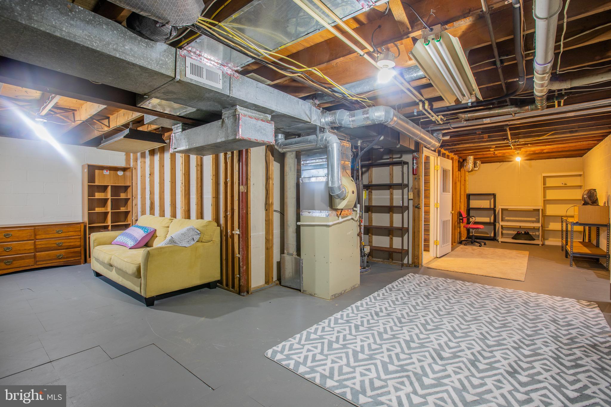 5806 Olson Road Brooklyn, MD 21225 - Photo 30 of 33 a building outdoor space with seating