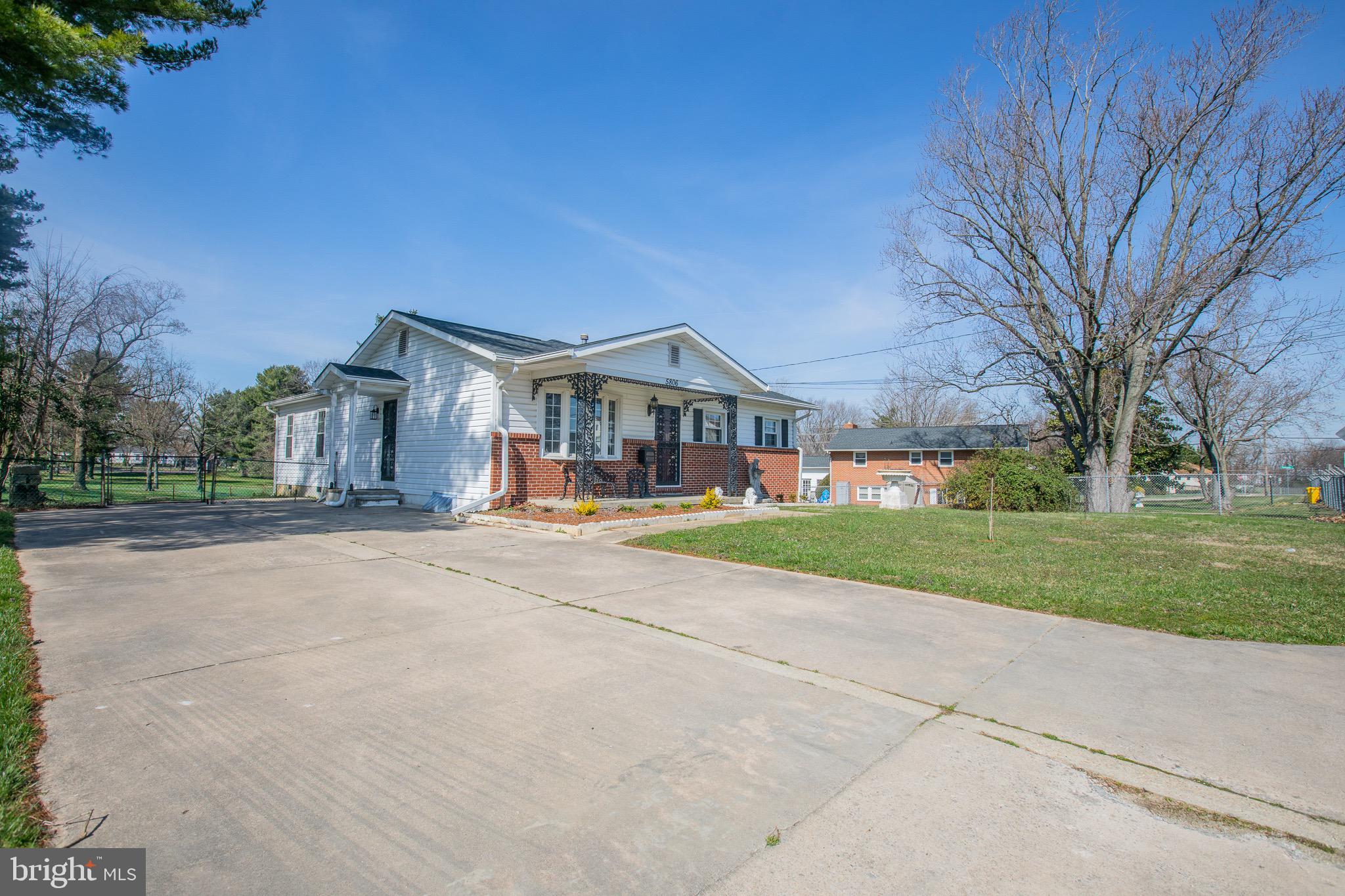 5806 Olson Road Brooklyn, MD 21225 - Photo 3 of 33 front view of house with a yard
