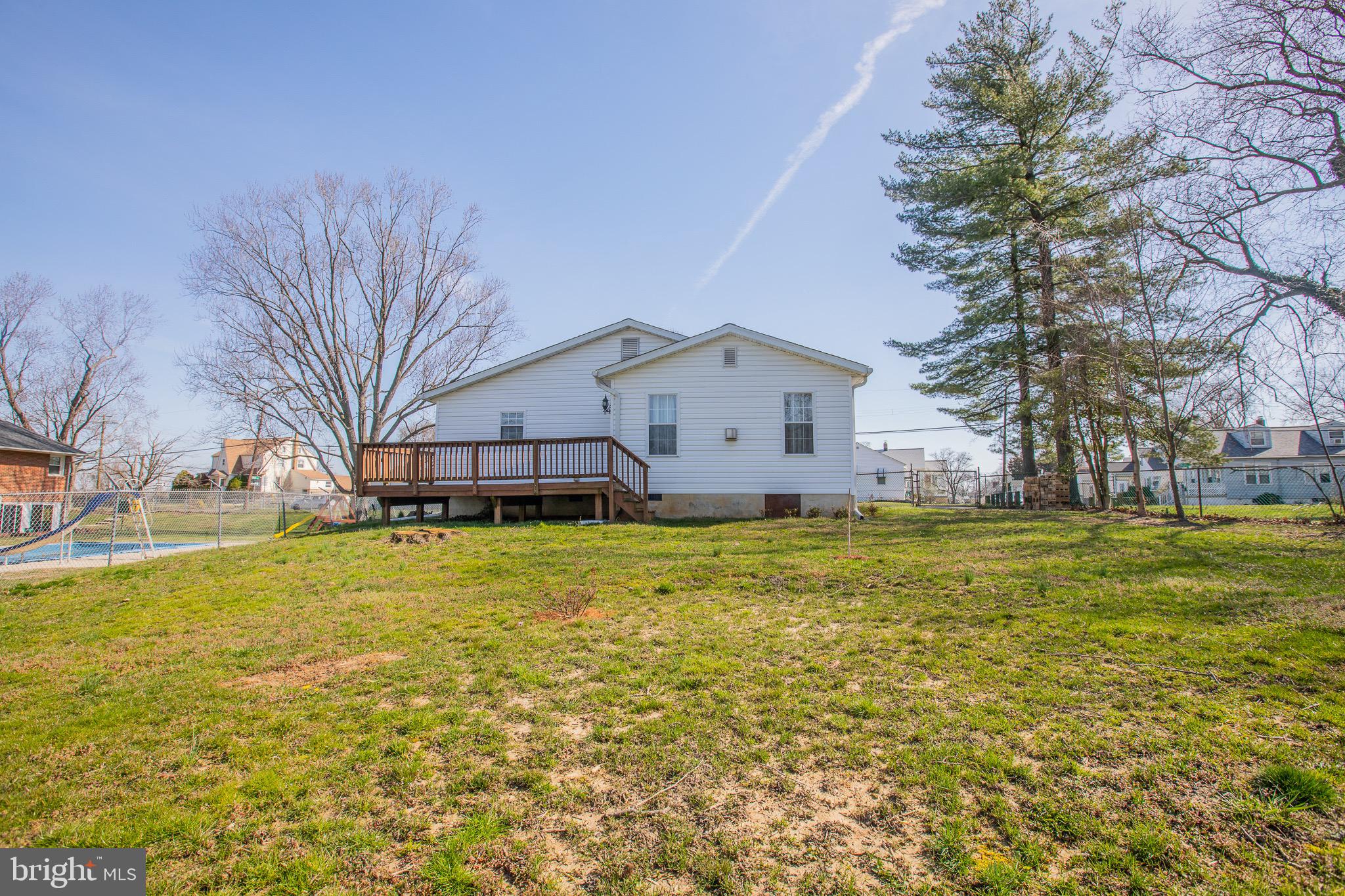 5806 Olson Road Brooklyn, MD 21225 - Photo 33 of 33 a view of a house with a yard
