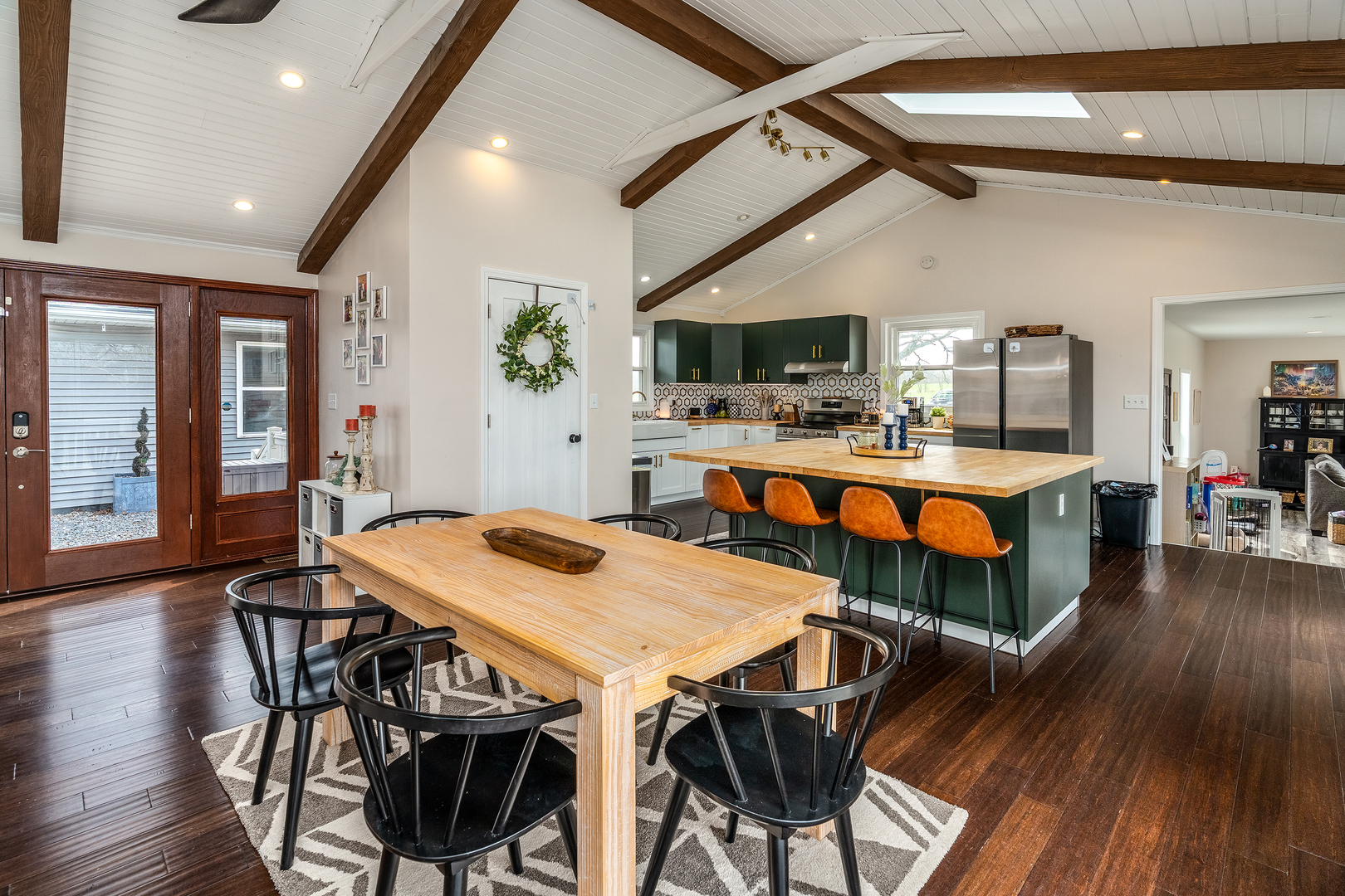 2930 Campground Road Anna, IL 62906 - Photo 16 of 70 a view of a dining room with furniture wooden floor and a chandelier