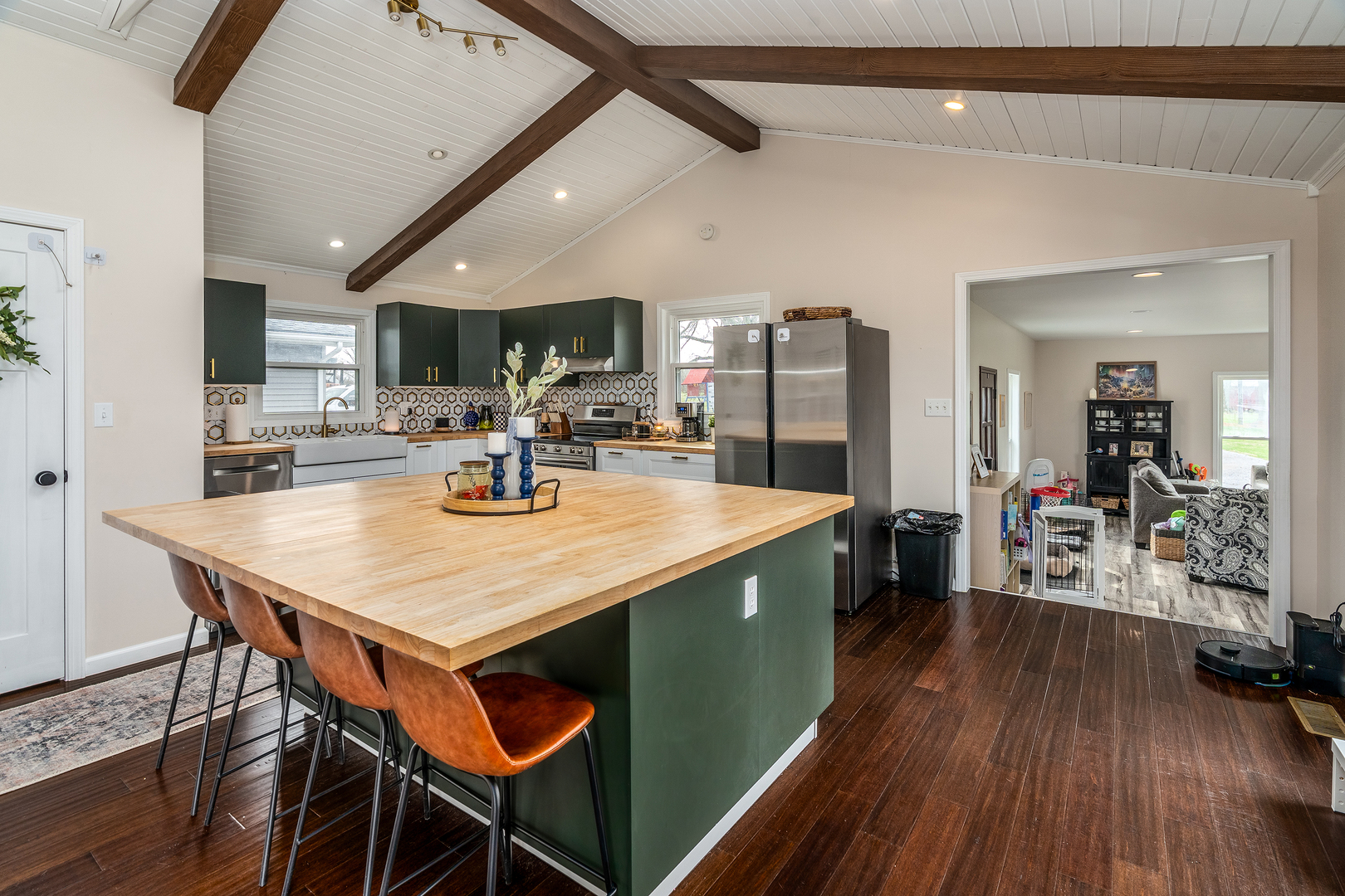 2930 Campground Road Anna, IL 62906 - Photo 21 of 70 a kitchen with stainless steel appliances a dining table chairs and wooden floor