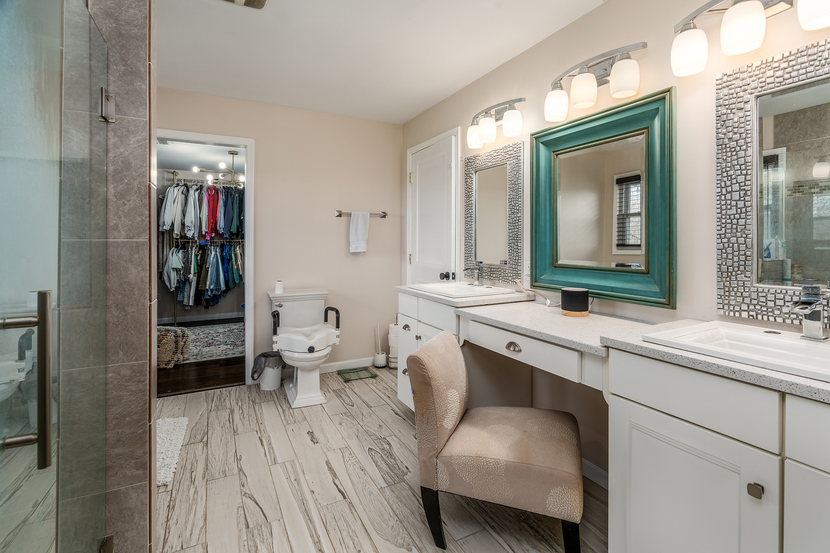 2930 Campground Road Anna, IL 62906 - Photo 30 of 70 a en suite bathroom with a toilet sink and mirror