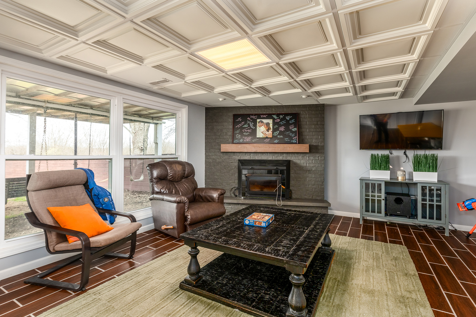 2930 Campground Road Anna, IL 62906 - Photo 45 of 70 a living room with furniture a flat screen tv and a fireplace