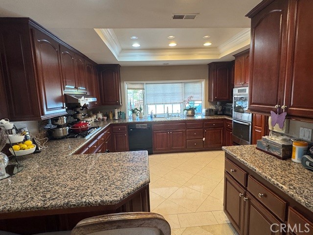 10821 Vida Drive Villa Park, CA 92861 - Photo 1 of 39 a kitchen with sink refrigerator and window