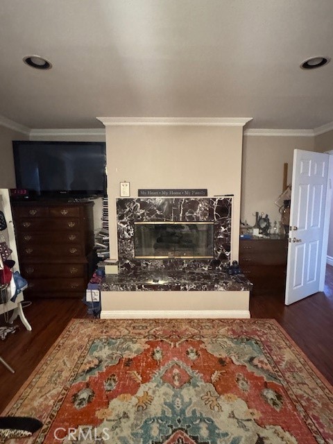 10821 Vida Drive Villa Park, CA 92861 - Photo 22 of 39 a living room with furniture a flat screen tv and a fireplace