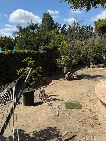 a view of a wooden bridge next to a lake