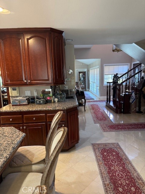 10821 Vida Drive Villa Park, CA 92861 - Photo 6 of 39 a kitchen with granite countertop a sink and cabinets