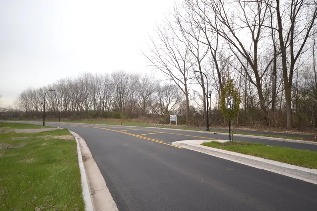 a view of a swimming pool with a yard