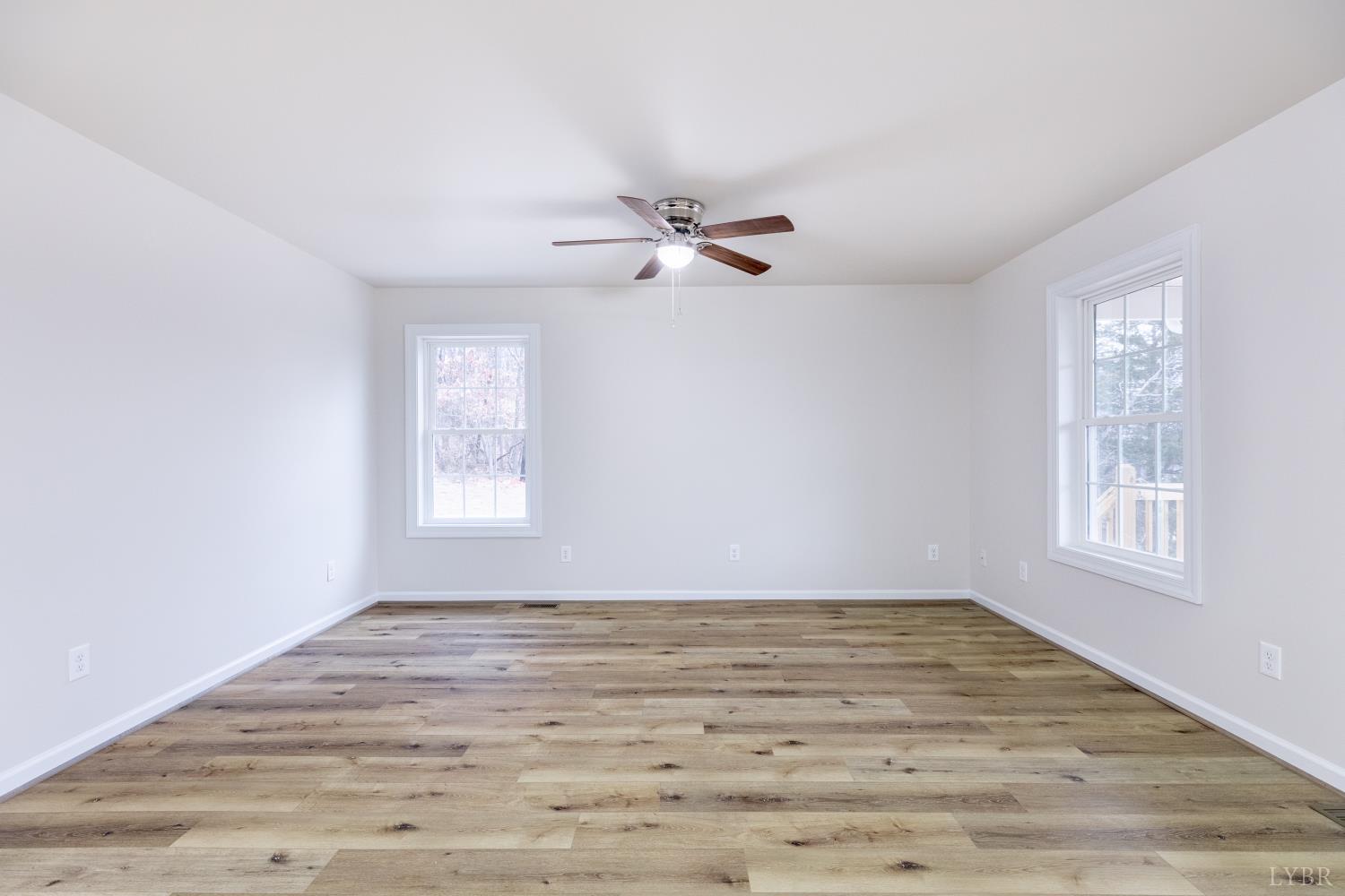 1104 15th Street Altavista, VA 24517 - Photo 2 of 47 wooden floor in an empty room with a window