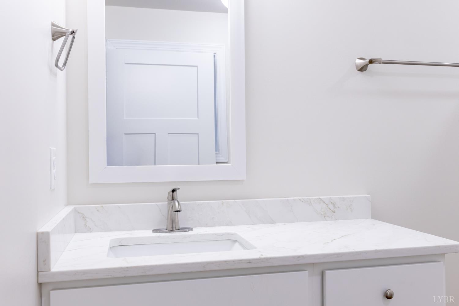 1104 15th Street Altavista, VA 24517 - Photo 21 of 47 a bathroom with a sink and a mirror