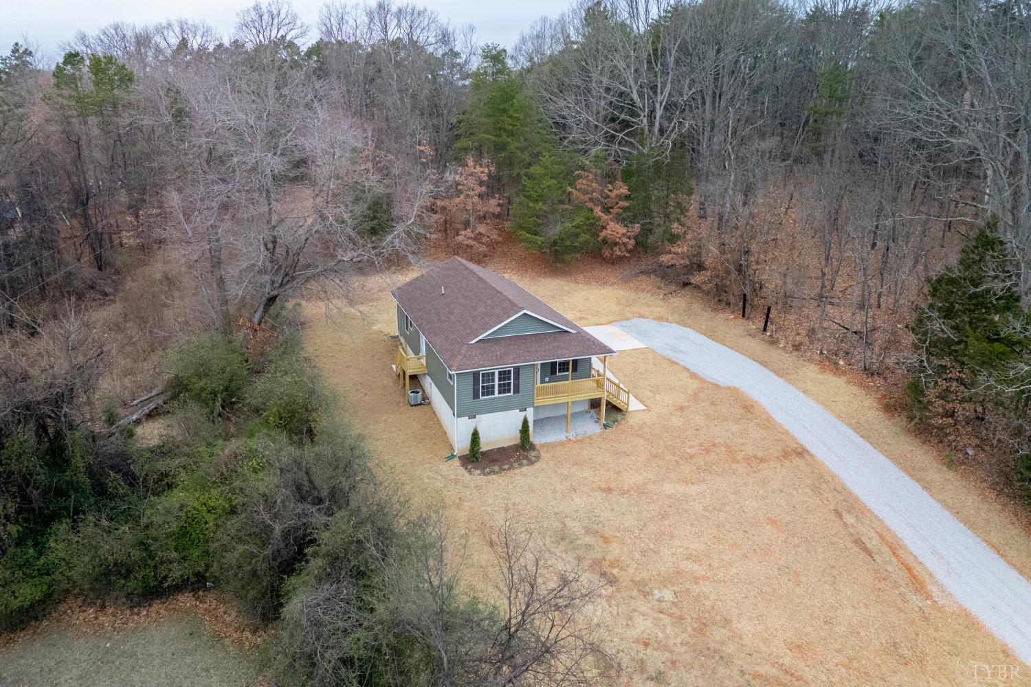 1104 15th Street Altavista, VA 24517 - Photo 28 of 47 an aerial view of a house with a yard and lake view