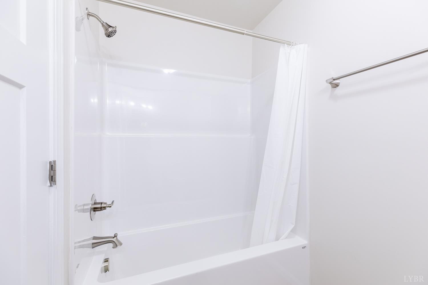 1104 15th Street Altavista, VA 24517 - Photo 37 of 47 a bathroom with a bathtub and a shower