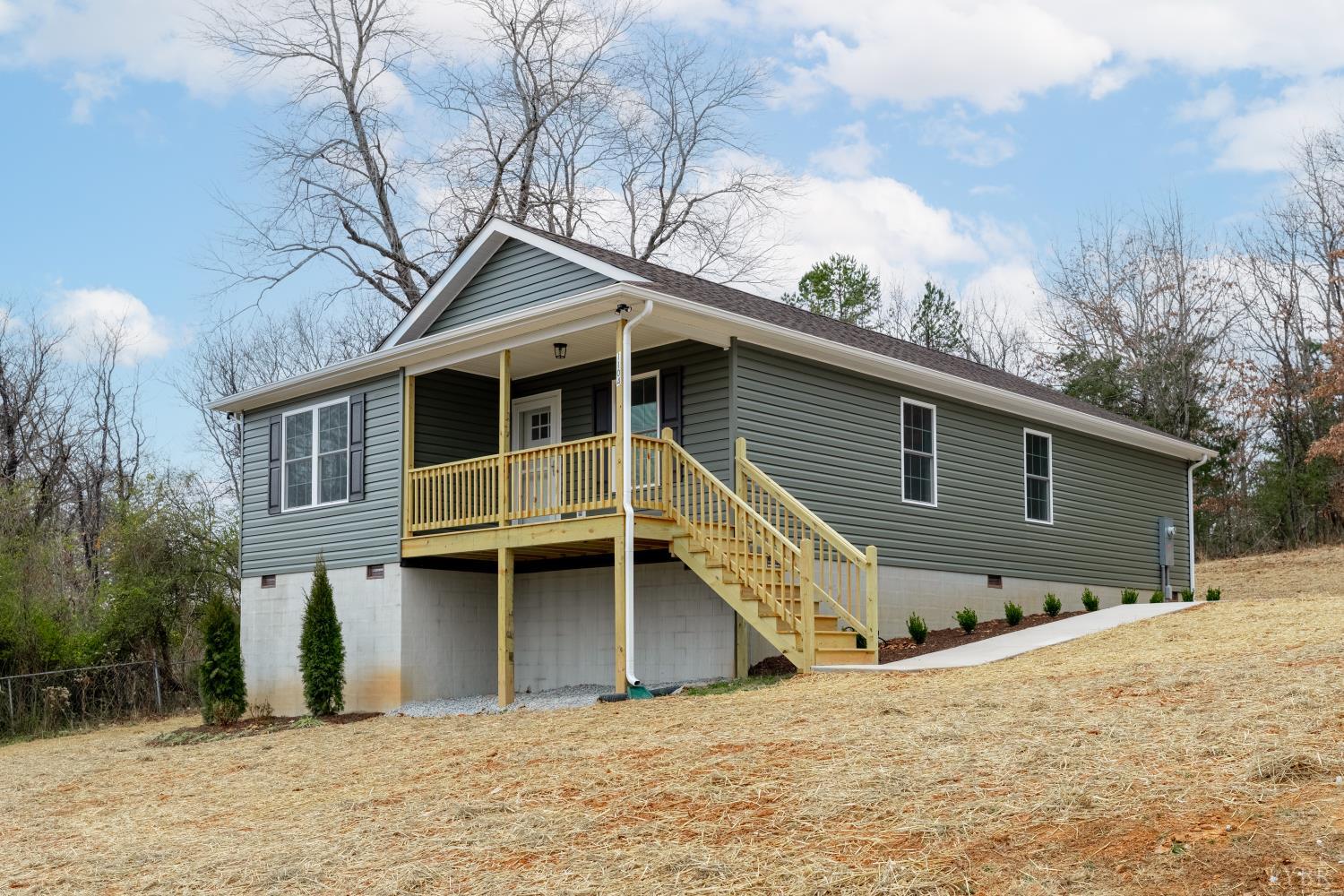 1104 15th Street Altavista, VA 24517 - Photo 41 of 47 a front view of a house with a yard and garage