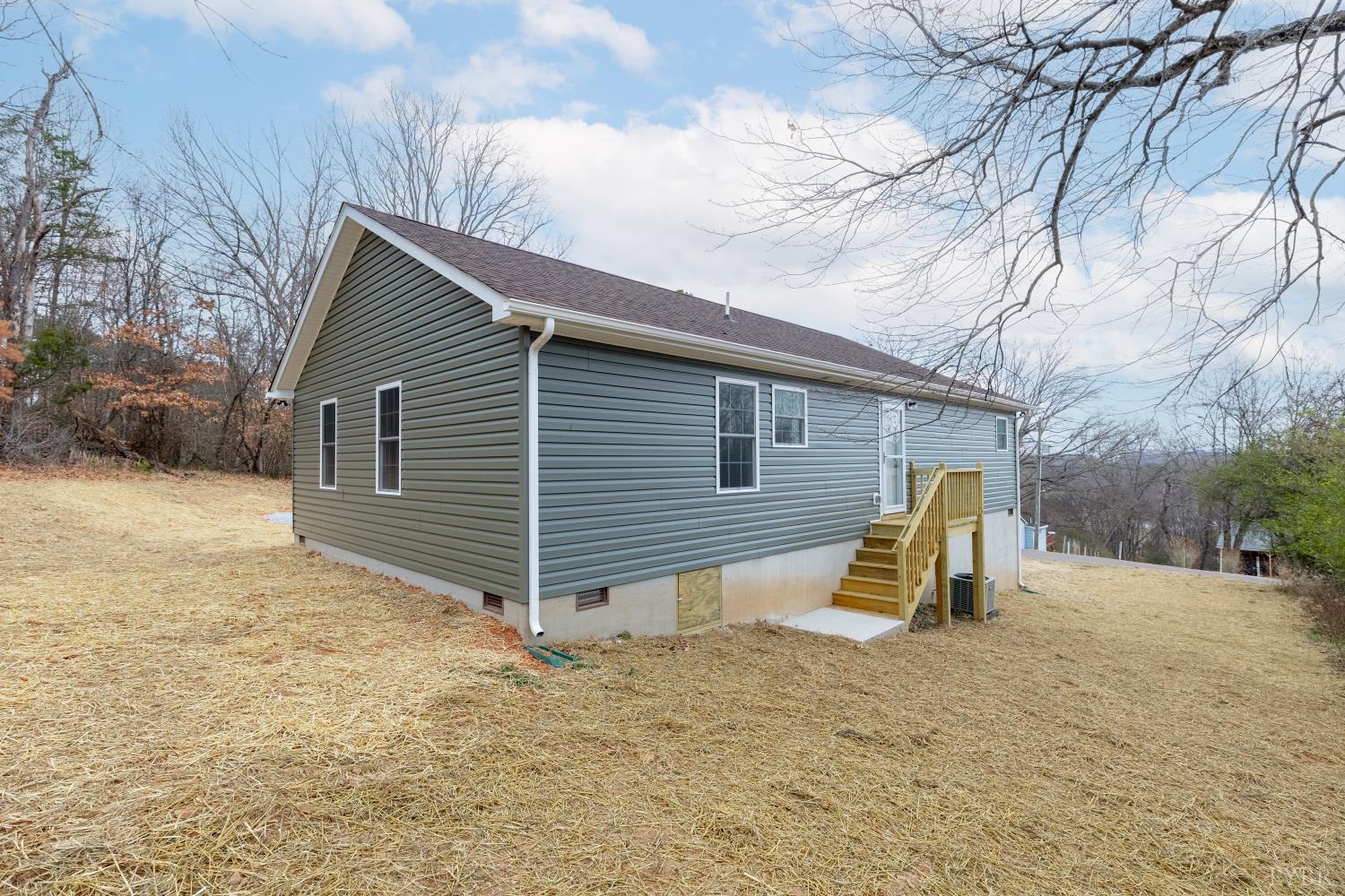 1104 15th Street Altavista, VA 24517 - Photo 45 of 47 a view of a house with backyard and chair