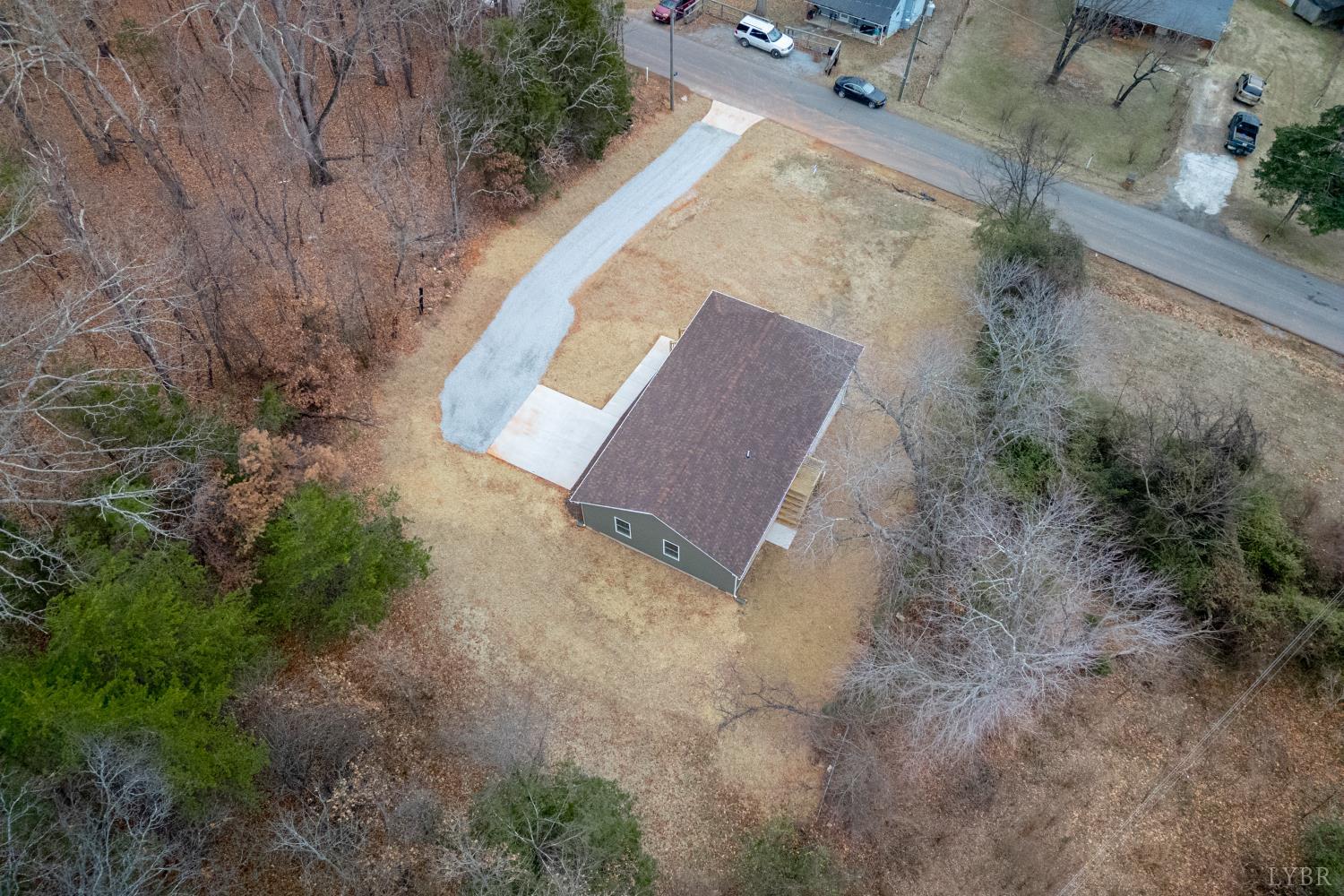 1104 15th Street Altavista, VA 24517 - Photo 47 of 47 an aerial view of a house with a yard and wooden fence