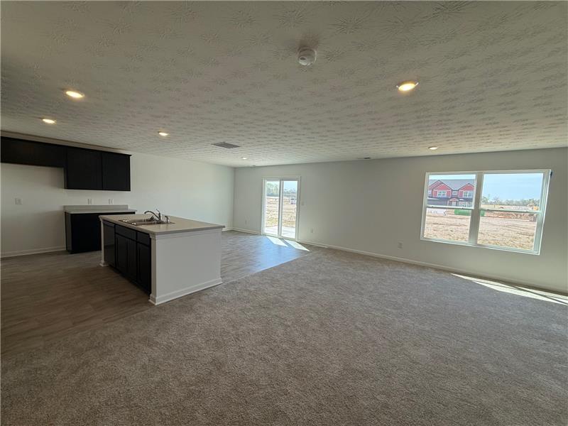4005 Chakeres Avenue Springfield, OH 45505 - Photo 4 of 19 This expansive open concept space offers a versatile layout, perfect for modern living and entertaining.