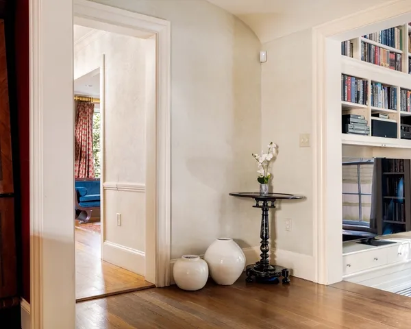 a view of living room with wooden floor