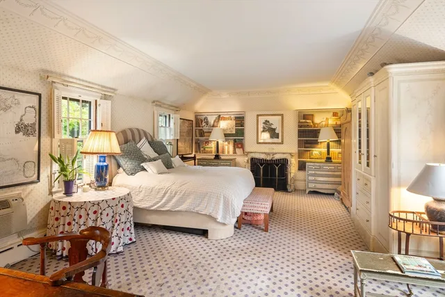 a bed room with a bed and a couch