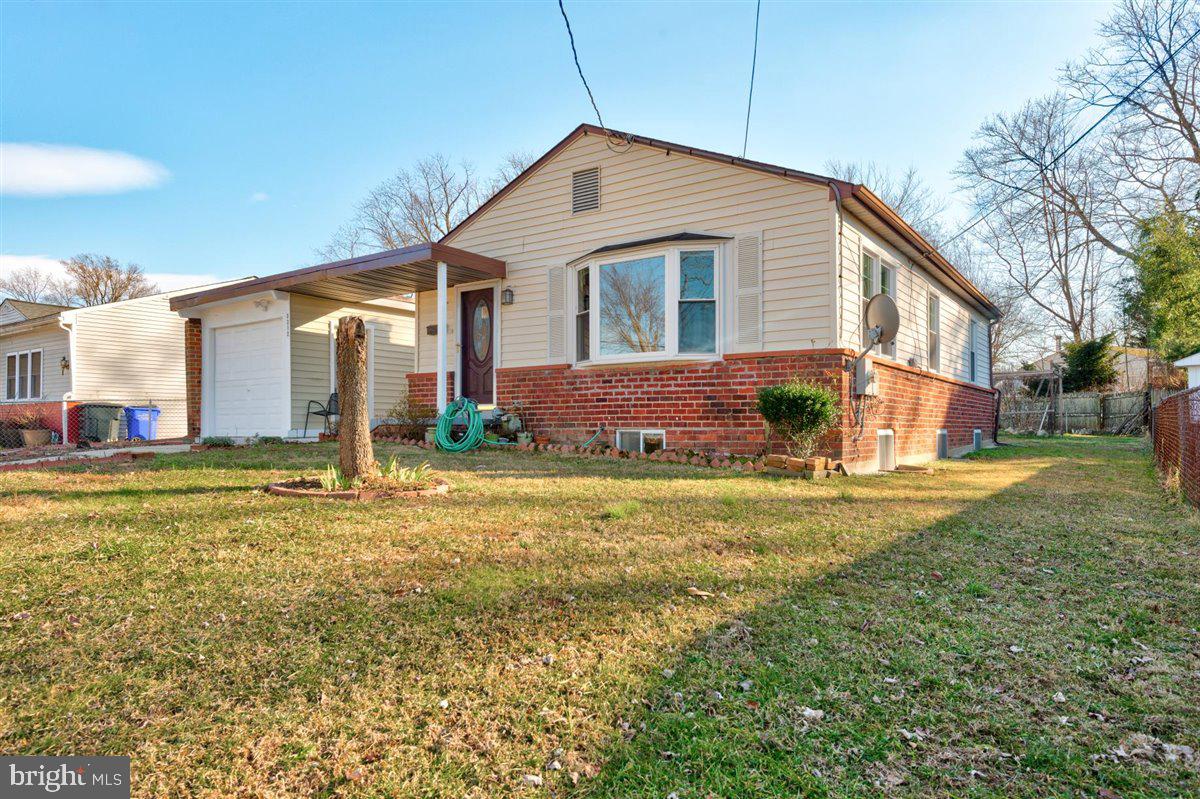 3312 Clay Street Silver Spring, MD 20902 - Photo 2 of 35 a front view of house with yard and trees around