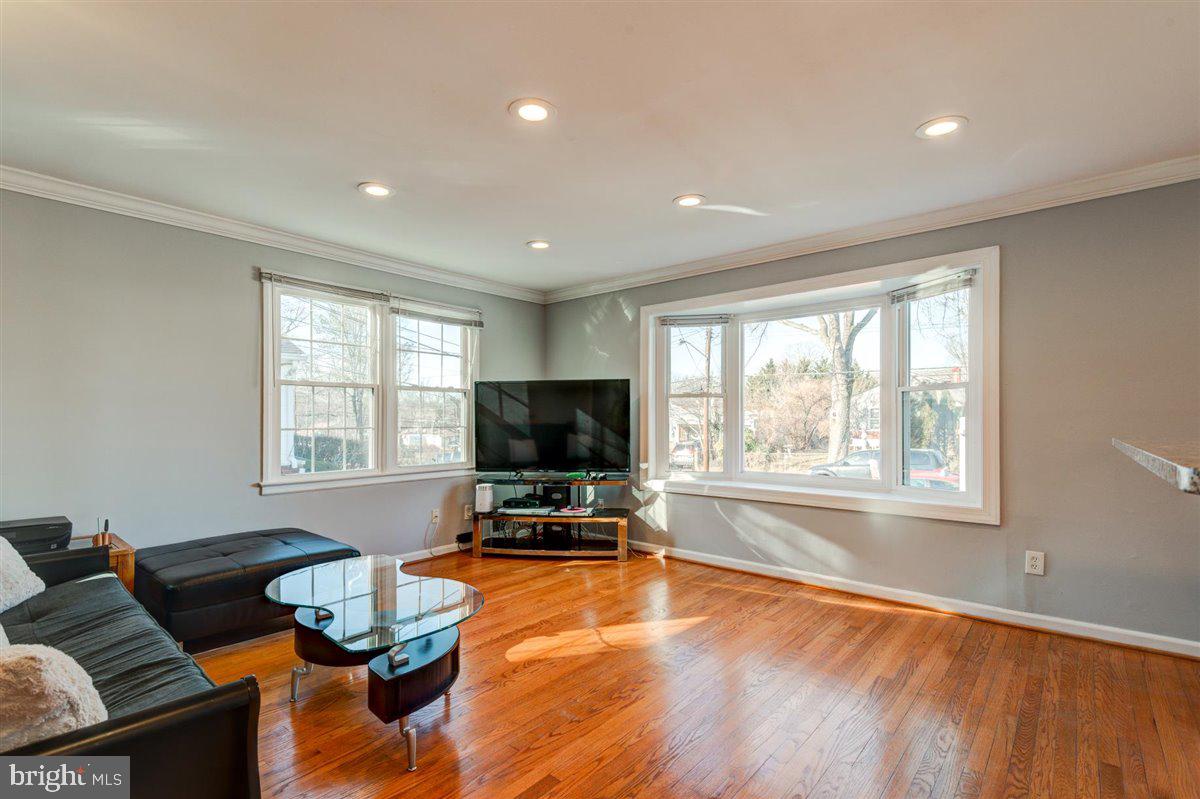 3312 Clay Street Silver Spring, MD 20902 - Photo 17 of 35 a living room with furniture flat screen tv and a large window