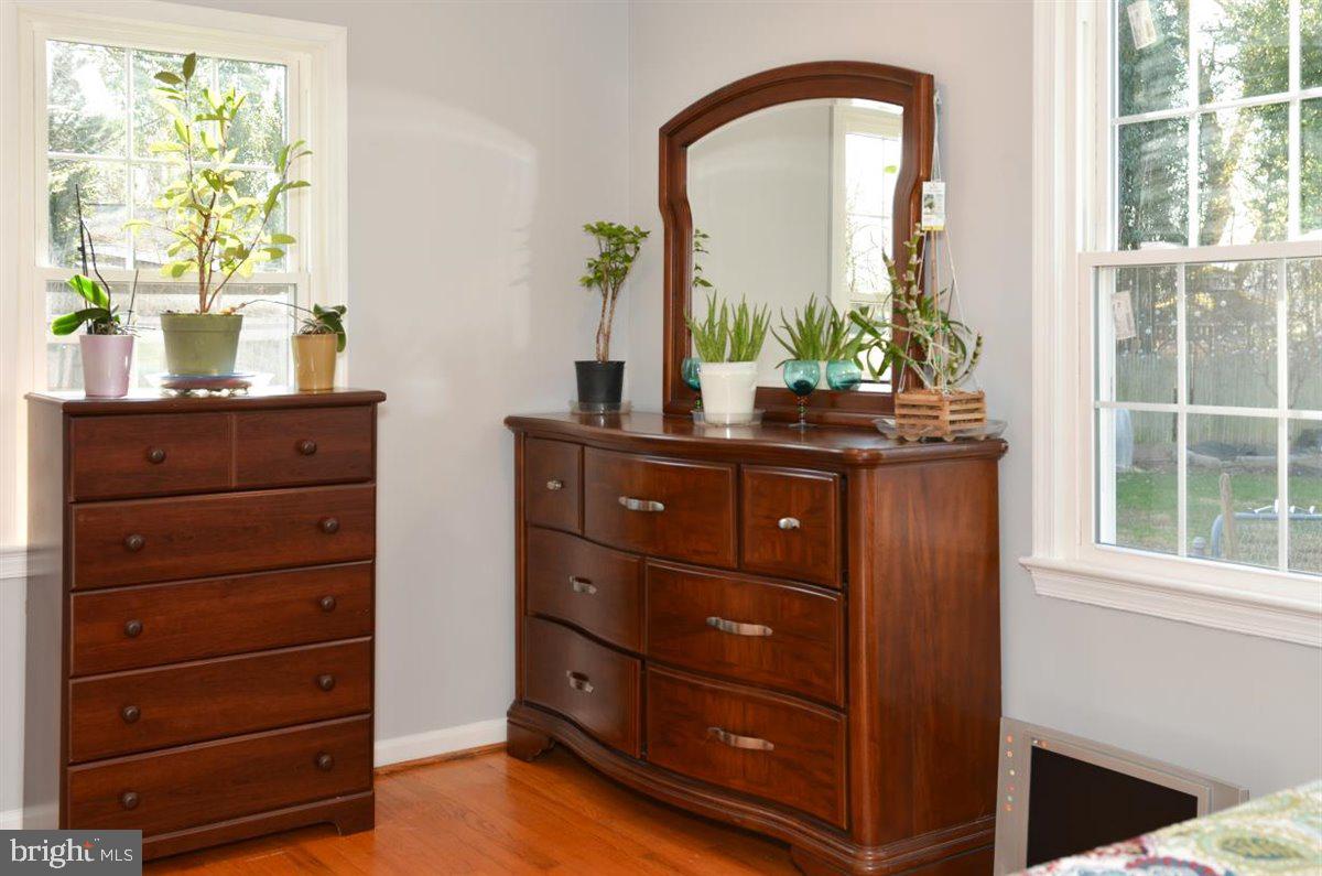 3312 Clay Street Silver Spring, MD 20902 - Photo 23 of 35 a room with a dresser with a mirror on it