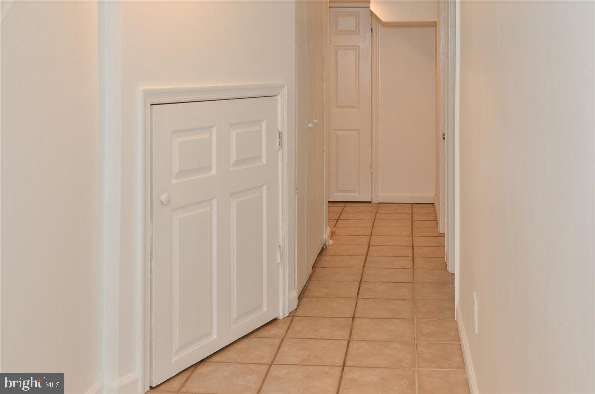 3312 Clay Street Silver Spring, MD 20902 - Photo 35 of 35 a view of a hallway with wooden floor and closet