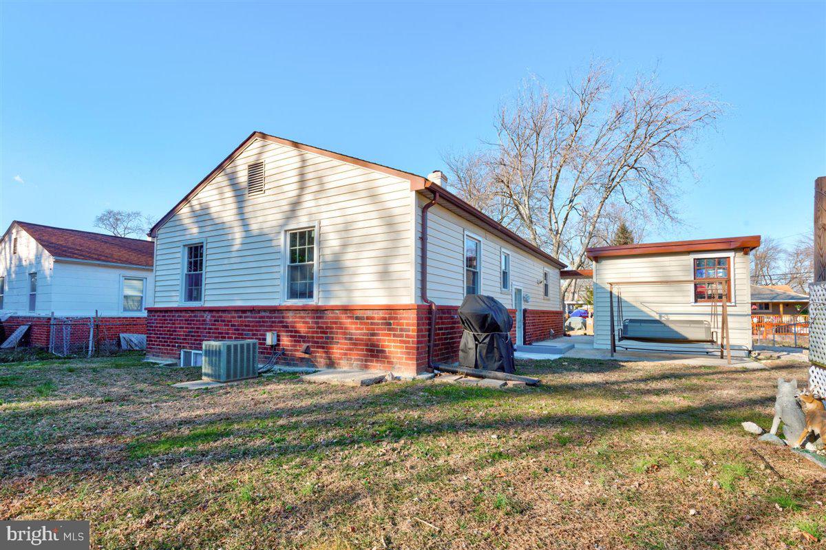 3312 Clay Street Silver Spring, MD 20902 - Photo 8 of 35 a view of backyard with red umbrella