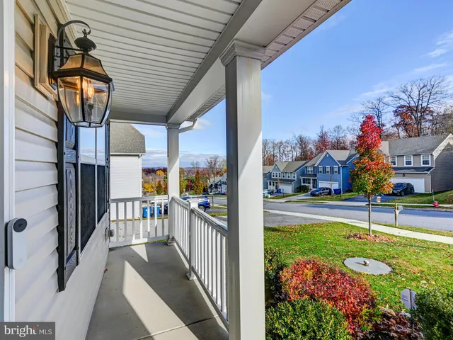 a view of a porch with a backyard