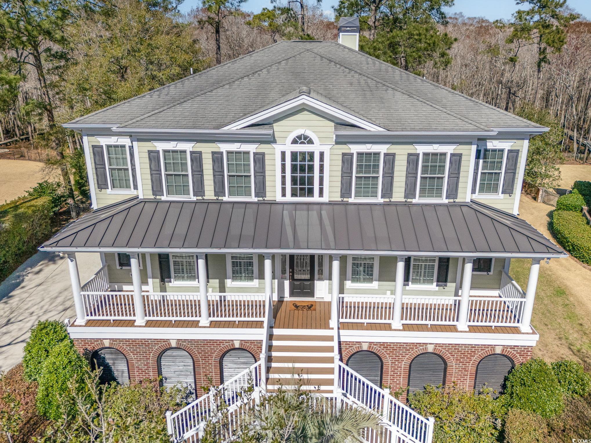 80 Stonington Drive Murrells Inlet, SC 29576 - Photo 3 of 40 View of front of house with double staircase a Beautiful big Front Porch "picture before new paint color"