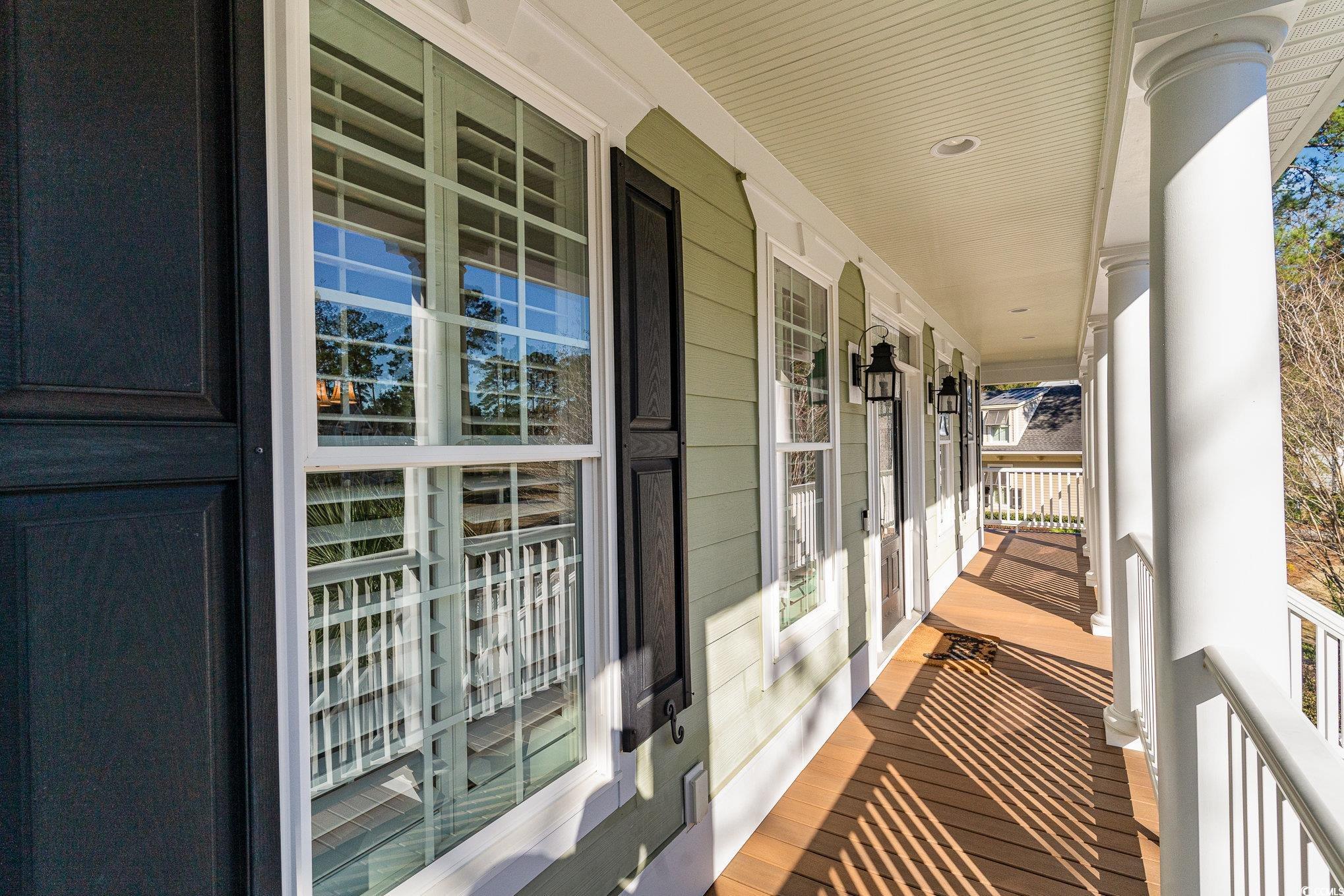 80 Stonington Drive Murrells Inlet, SC 29576 - Photo 5 of 40 Trex Decking on Steps and Porch were replaced in 2024 "Picture before new paint color"