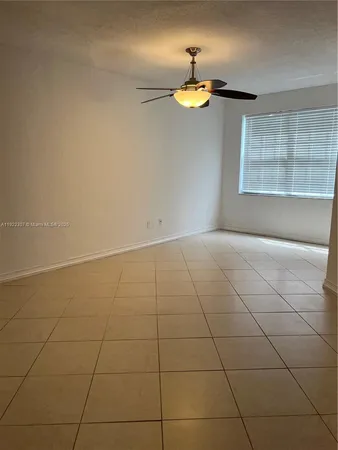 a view of a kitchen with a sink